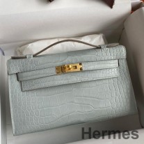 Geanta Hermes Kelly Pochette lucrata manual din piele de aligator mat perla gri