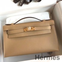 Borsa Hermes Kelly Pochette fatta a mano in pelle di vitello Swift biscotto