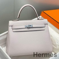Bolsa Hermes Kelly 25cm Retourne em couro Mauve Pale Clemence
