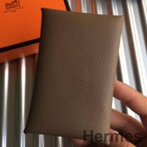 Porta-cartões Hermes Calvi em couro Taupe Epsom