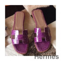 Sandálias Hermes Oran em crocodilo Niloticus roxo brilhante