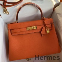 Hermes Kelly Retourne 32 ručno izrađena torba od narančaste Clemence kože