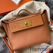 Torba Hermes 24/24 Mini 21 Touch w kolorze złotym Evercolor i strusiej skórze