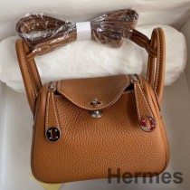 Ręcznie robiona torebka Hermes Mini Lindy ze złotej skóry Clemence