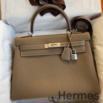 Bolso Hermes Kelly Retourne 32 hecho a mano en cuero Clemence color topo