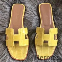 Sandalias Hermes Oran en cocodrilo Niloticus brillante amarillo