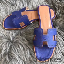 Sandalias Hermes Oran Slide en piel de becerro perforada Epsom azul