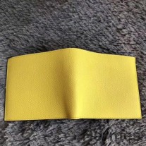Cartera compacta Hermes MC² Copernic amarilla