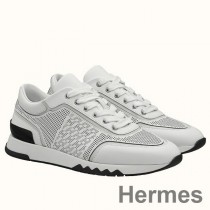 Hermes Zapatillas C-Addict de piel de becerro perforada blanca de hombre