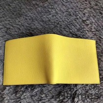 Cartera compacta Hermes MC² Copernic amarilla