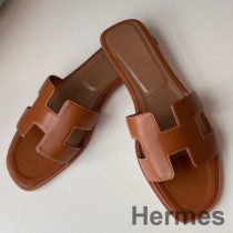 Hermes Sandales Oran Slide En Cuir De Veau Swift Doré