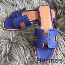 Hermes Oran Slide szandál kék Epsom perforált borjúbőrből