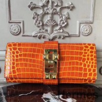 Hermes Medor clutchveske i oransje krokodilleskinn